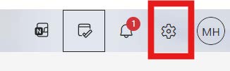 Outlook toolbar with the settings gear icon highlighted.