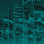 International flags flying on flagpoles.